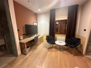 TV a/nebo společenská místnost v ubytování Zigante Rooms