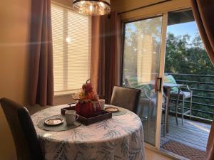 a table with a bowl of fruit on top of it at Gatlinburg Summit Studio for 2 With Amazing View! in Gatlinburg