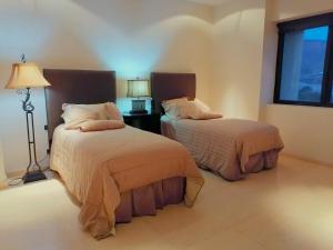 Gallery image of Condo VistaMar in Puerta Cortes, Luxury 2BR 2Bath Condo Private beach & pool! in La Paz