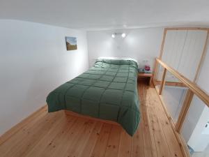 Ένα ή περισσότερα κρεβάτια σε δωμάτιο στο Tinos youth apartment