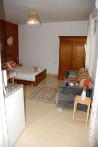 Postel nebo postele na pokoji v ubytování Studio lumineux avec terrasse