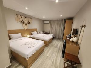 Postel nebo postele na pokoji v ubytování Diyar Pyramids Inn