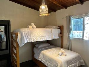 Postel nebo postele na pokoji v ubytování Alojamiento céntrico en Puyo