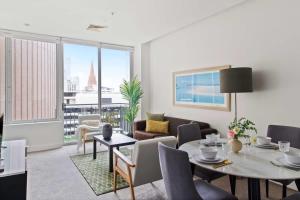 Istumisnurk majutusasutuses A Cozy 2BR Apt on Collins Near Flinders Station