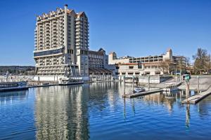 a large building next to a large body of water at Walk Downtown Stunning Condo with Attached Garage in Coeur d'Alene