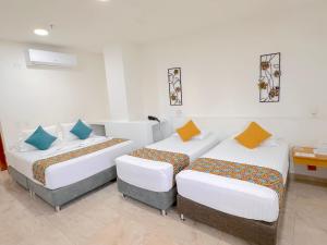 Hotel Grand Caribe客房内的一张或多张床位