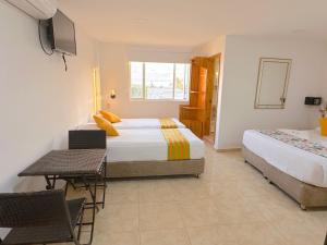 Hotel Grand Caribe客房内的一张或多张床位