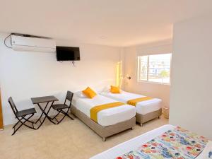Hotel Grand Caribe客房内的一张或多张床位