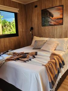 En eller flere senge i et værelse på Casa de playa Casamigos Miramar