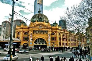 a large yellow building with a clock on top of it at Rb4 801-20 Coro in Melbourne
