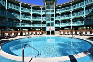 a large pool in the middle of a building at Sea Breeze 311 in Gulf Shores