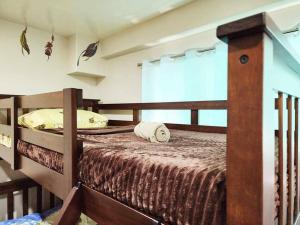 a bedroom with two bunk beds in a room at City Oasis: Steps Away from Urban Buzz in Baguio