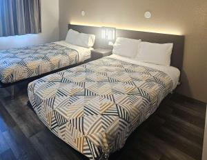 Postel nebo postele na pokoji v ubytování Motel 6 Sinton TX