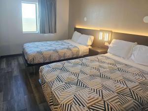 Postel nebo postele na pokoji v ubytování Motel 6 Sinton TX