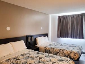 Postel nebo postele na pokoji v ubytování Motel 6 Sinton TX
