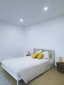 מיטה או מיטות בחדר ב-Monte da Boavista