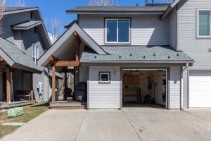 a house with a garage in the driveway at Cozy Hailey Haven in Hailey