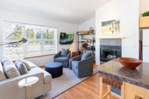 a living room with a couch and a fireplace at Cozy Hailey Haven in Hailey