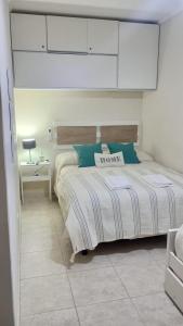 Postelja oz. postelje v sobi nastanitve Monoambiente Atenea