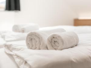 Postel nebo postele na pokoji v ubytování NRV Top 567 XL