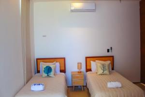 Postel nebo postele na pokoji v ubytování Patmos ocean view 3 bedroom house + 41 fotografií