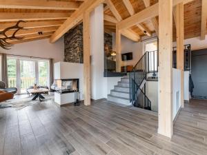 Televízia a/alebo spoločenská miestnosť v ubytovaní Haus Vlietländer