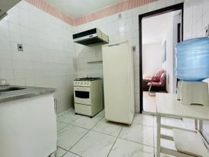 מטבח או מטבחון ב-Apartamento 201 / 40 2/4, a 2 minutos da praia