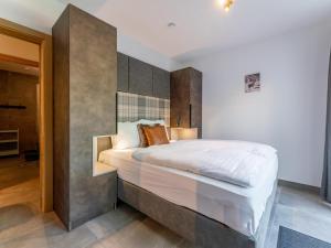 Łóżko lub łóżka w pokoju w obiekcie Wanderlust Mountain Chalet