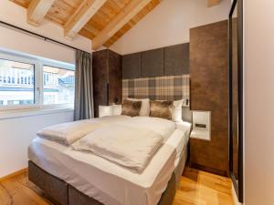 Łóżko lub łóżka w pokoju w obiekcie Wanderlust Mountain Chalet
