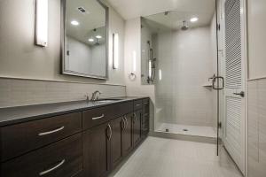 a bathroom with a sink and a shower at Casa Catherine in Austin