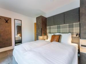 Łóżko lub łóżka w pokoju w obiekcie Wanderlust Mountain Chalet