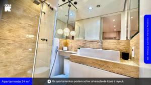 a bathroom with a sink and a shower at 1811 - Rentaqui Summint Premium Pinheiros in Sao Paulo +18 photos