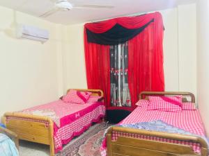 Voodi või voodid majutusasutuse Chalets and apartments Al-Nawras Village Ismailia toas