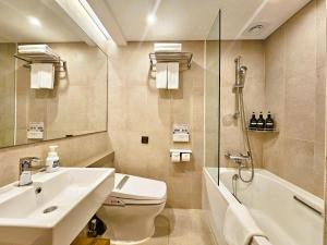 Koupelna v ubytování Hotel Uri&