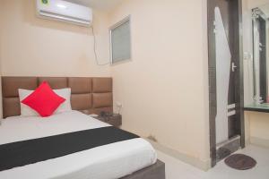 Ένα ή περισσότερα κρεβάτια σε δωμάτιο στο Hotel Stay In