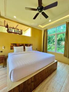 Voodi või voodid majutusasutuse BAMBOO OASIS toas