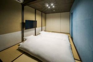 Katil atau katil-katil dalam bilik di Asagi an Machiya House