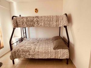 Ένα ή περισσότερα κρεβάτια σε δωμάτιο στο La casa frente a la alberca +30 φωτογραφίες