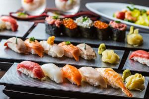 a bunch of sushi on plates on a table at Hakone Kowakien Miyamafurin in Hakone