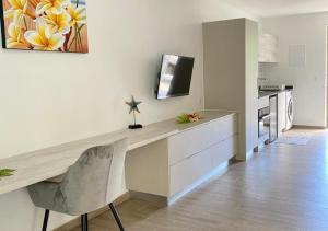 Kuchyň nebo kuchyňský kout v ubytování Mareta Lodge - studio RUA 2 + 5 fotografií