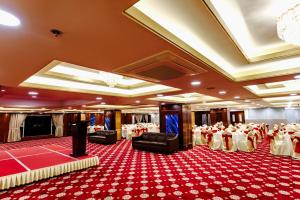 a banquet hall with tables and chairs in a room at Hotel Central Inn & Spa in Dhaka