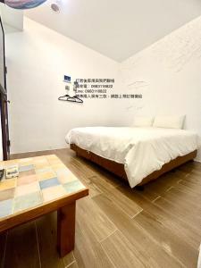 Postelja oz. postelje v sobi nastanitve Nanwan254 Homestay