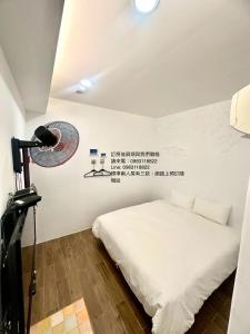 Postelja oz. postelje v sobi nastanitve Nanwan254 Homestay