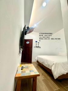 Postelja oz. postelje v sobi nastanitve Nanwan254 Homestay