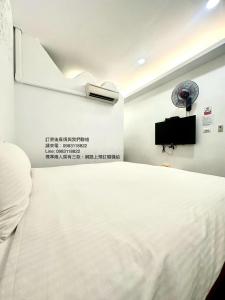 Postelja oz. postelje v sobi nastanitve Nanwan254 Homestay