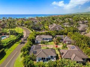 an aerial view of a residential neighborhood with houses at Cute 2BR Cottage w AC close to beaches in Koloa