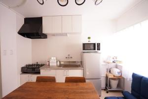 Cucina o angolo cottura di Lino下伊福 岡山駅車で5分 無料駐車場 レストラン徒歩圏内多数