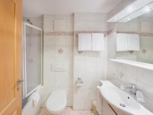 Koupelna v ubytování Apartments Aura