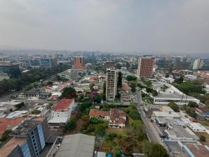 an aerial view of a city with buildings at N8 Loft estilo Industrial en Ciudad de Guatemala in Guatemala
