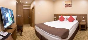 Red Rock Resort tesisinde bir odada yatak veya yataklar